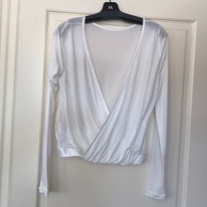 Women’s soft white Nike yoga top. Med. Never worn!